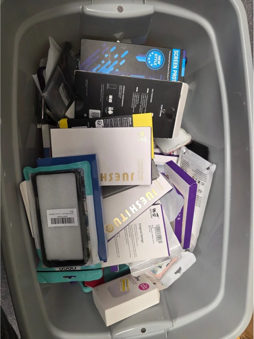 Bulk Lot of 50 phone cases and screen protectors for all types of phones.